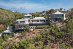 Aerial view of Villa Felicita hillside retreat with pool terraces, St. Barts